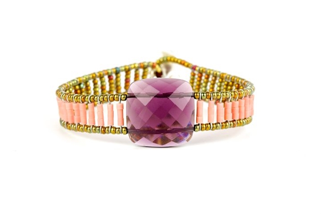 Ziio's Armonia Tennis Bracelet features a large Purple Amethyst Gemstone at the center with Pink Howlite Beads on the band. Gold Murano Glass seed Beads outline the band. 925 Sterling Silver Button Closure, adjustable in length.