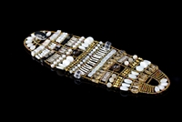 A stunning statement Cuff Bracelet with Citrine & Smokey Quartz Gemstones intermixed with various shapes of White Water Pearls, Mother of Pearl, Crystal and Silver Beads. Hand crafted in Italy by Ziio with Murano Glass seed Beads on Stainless Steel wire.