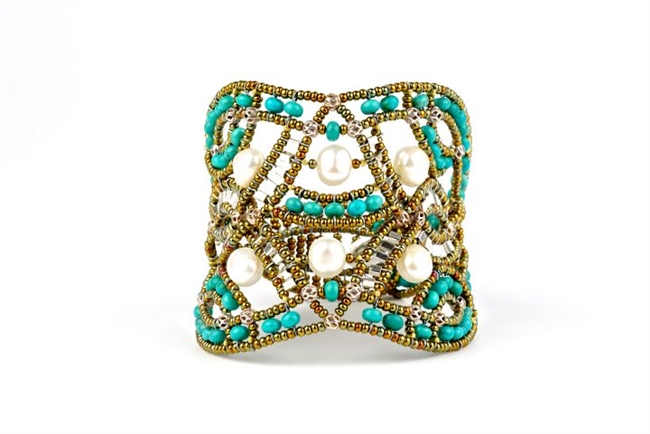 This beautiful Blue Turquoise Gemstone Cuff Bracelet is hand crafted by Ziio and features an intricate net/lace design, accented with White Water Pearls. Made with stainless steel wire & golden Murano Glass seed Beads. Made in Italy.