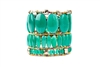 Turn them green with envy with this statement cuff Bracelet by Ziio. Large vibrant Green Onyx Gemstones, oval in shape, create this beautiful piece. Accents of Pyrite Beads add the finishing touch. Hand crafted in Italy. Sterling Silver Button closure