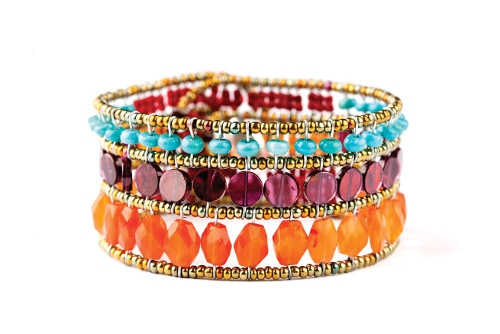 This classic beaded Cuff Bracelet by Ziio features a single row of small Turquoise Gemstones, followed by a row of Red Garnets and completed with faceted Orange Carnelian. Outlined and framed in Murano Glass Seed Beads.   Sterling Silver Button Closure.
