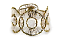 From Ziio's Permanent Collection, this Cosmic Cuff Bracelet is perfect for those who want unique. Large White Baroque Freshwater Pearls are the focus of this design, accented by White Mother of Pearl Beads, Silver beads & Onyx Gemstones. Hand crafted in