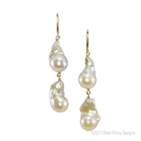 Love the Baroque Pearl? This White, Double Drop, Baroque Pearl Chandelier Earring is sure to satisfy. Made in the U.S. by Silver Pansy, they are done in White Sterling Silver. Hooks. No two pairs are alike. Length 2 3/4", Width 1/2"