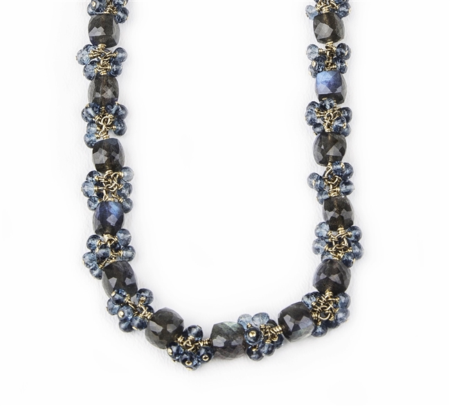 Hand Crafted, this Bracelet features uniquely cut "Cubed" Labradorite Gemstones, alternating with clusters of brilliant, faceted, London Blue Topaz Gemstones. These two Gemstones compliment each other  perfectly. Gold Filled Sterling Chain & Latch.