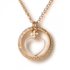 In this "Cor" Heart Pendant Necklace by Tuum, the little heart is protected inside the ring which shows the Latin â€œPater Nosterâ€ (Our Father) text in micro relief. 18k Gold. Made in Italy. Chain 16 inches, Pendant 5/8 inch