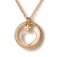 In this "Cor" Heart Pendant Necklace by Tuum, the little heart is protected inside the ring which shows the Latin â€œPater Nosterâ€ (Our Father) text in micro relief. 18k Gold. Made in Italy. Chain 16 inches, Pendant 5/8 inch