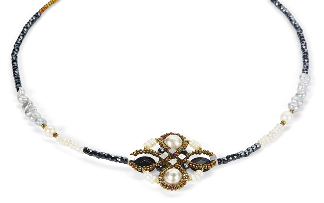 Ziio's Knott Necklace in a classic contrast of Black & White - Black Onyx, White Pearls & Silver Beads. A Flower Knott at the center is the focus of this piece. Hand crafted in Italy with Murano Glass seed beads on stainless steel wire.