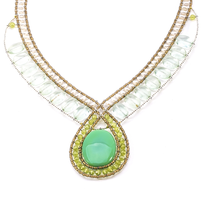 Beaded Pendant Necklace has polished Apple Green Onyx Cabochon accented with Green Peridot & Fluorite Gemstone and White Fresh Water Pearls. Soft hues make this piece noticeable. Hand crafted in Italy. Sterling Button Closure. Adjustable length 18" to 16"