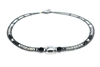 Necklace features a large, square Sterling Silver Bead at the center. The neck band is in Black Tourmaline & Zirconia Gemstones, Grey Pearls & Silver Beads. Hand crafted in Italy it is on Stainless Steel wire with Grey Murano Glass seed Beads.