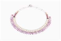 From Ziio's Mistinquett Collection ,this Mother of Pearl Necklace is like no other. A single row of Pearl Beads is complimented by a fan like effect of Pink Bohemian Glass Beads and accented by Murano Glass Beads.