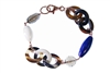 Natural Brown Horn link Bracelet with random accents of Blue Lapis, Smokey Quartz & White Agate Gemstones. The links are held together with Rose Gold plated 925 Sterling Silver Chain links. 8" in length. Lobster Clasp. Made in Italy by Amle