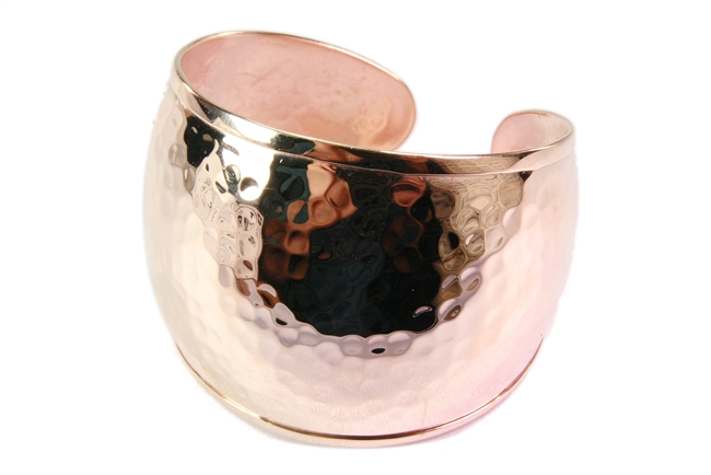 This wide, 925 Sterling Silver Cuff Bracelet has a hammered, texture finish & plated in Rose Gold.  Made in Italy by Claudio Faccin. Size Medium