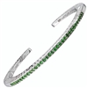 Narrow stacking bangle with 33 rare, Green Tsavorite Garnet Gemstones (2ctw). Open scroll work design on the sides, with designer Martha Seely's signature interlocking spirals. Hinged on one side for ease of fit. 4mm Wide. Rhodium plated 925 SS. size Med