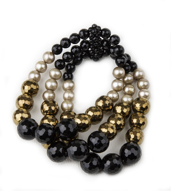 Faceted Black Onyx Gemstones alternate with Bronze Hematite Beads and Cream Pearls. The Gemstones & Pearls graduate in size on this 3-strand, elastic stretch Bracelet. Made in Italy by Rajola. Length aprox 6 1/2"