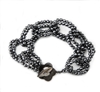 Bold & beautiful! This Infinity Bracelet features interlocking, double links of faceted, dark Grey, Hematite Beads. Made in Italy by Rajola. It has a Mother of Pearl toggle closure. L 7 1/2" to 9" adjustable. Width 1"