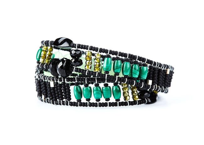 From Ziio's Twilight Collection. This double wrap Boa Bracelet is a beautiful blend of various hues of Green outlined in Black. Malachite, Calcedony, Chalcedony, Zircon, Black Tourmaline & Murano Glass Beads. 925 Sterling Silver Button Closure, adjustable