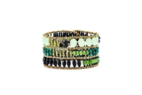 From Ziio's Twilight Collection, crafted in Italy, this wide Cuff Bracelet is a wonderful mix of shades of Green Gemstones and Black Gemstones. Chrysoprase, Malachite, Onyx, Jade, Brass & Murano Glass Beads. 925 Sterling Silver Button Closure,