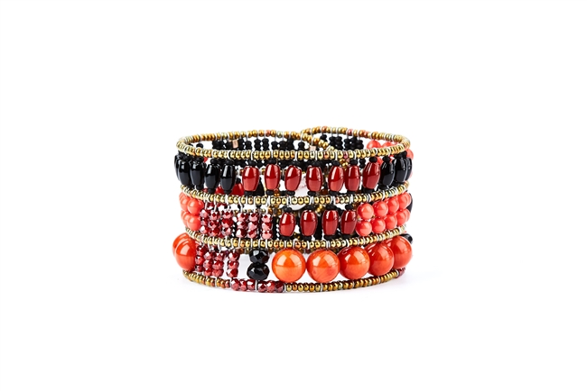 From Ziio's Twilight Collection, crafted in Italy, this wide Cuff Bracelet is a wonderful mix of shades of Red & Orange Gemstones and Black Gemstones. Garnet, Carnelian, Coral, Onyx, Tourmaline & Murano Glass Beads. 925 Sterling Silver Button Closure