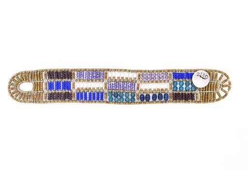 From Ziio's Fenice Collection - this Patchwork designed Cuff Bracelet features a mix of Blue & Purple Gemstones. Blue Lapis, Amethyst & Zircon Gemstones are accented with Blue Apitite & White Pearls in this linear design. Made in Italy