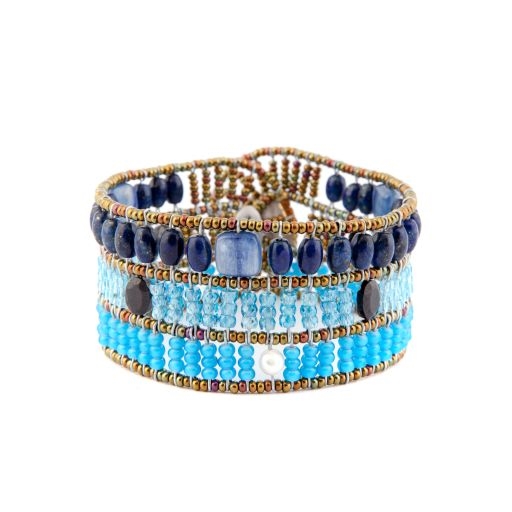 From Ziio's Fenice Collection - this Cuff Bracelet features a medley of Blue Gemstones. Blue Lapis, Kyanite & Zircon Gemstones are accented with Black Spinel & White Pearls in this linear design. Made with Murano Glass Beads on Stainless Steel Wire.