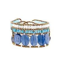 From Ziio's new Spring/Summer Collection the "Goiaba" Cuff Bracelet is done in Blue Kyanite, Iolite, Apetite & Zircon Gemstones. Accented with White WaterPearls and Murano Glass Seed Beads. On stainless steel wire with a Sterling Silver Button Closure