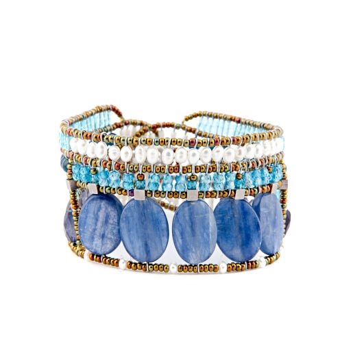 From Ziio's new Spring/Summer Collection the "Goiaba" Cuff Bracelet is done in Blue Kyanite, Iolite, Apetite & Zircon Gemstones. Accented with White WaterPearls and Murano Glass Seed Beads. On stainless steel wire with a Sterling Silver Button Closure