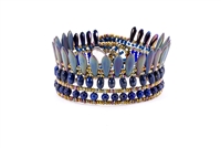 From Ziio's Mistinquett Collection, this hand-crafted bracelet has double rows of Lapis Gemstones  complimented by a fan like effect of Blue Bohemian Glass Beads and accented by Murano Glass Beads. 925 Sterling Silver Button Closure. Adjustable length.