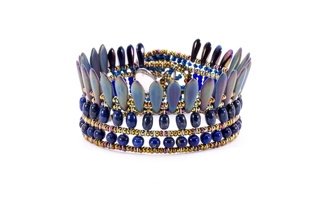 From Ziio's Mistinquett Collection, this hand-crafted bracelet has double rows of Lapis Gemstones  complimented by a fan like effect of Blue Bohemian Glass Beads and accented by Murano Glass Beads. 925 Sterling Silver Button Closure. Adjustable length.