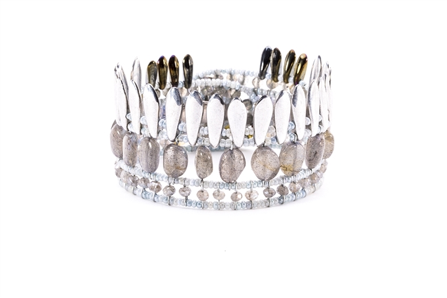 From Ziio's Mistinquett Collection, this bracelet is like no other. Double rows of Labradorite Gemstones are complimented by a fan-like effect of polished Silver Bohemian Glass Beads and accented by Murano Glass Beads. 925 Sterling Silver Button closure.