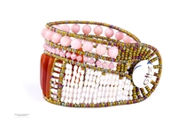 This beautiful Designer Cuff Bracelet has polished Red Onyx Gemstones accented with Pink Agate & White Fresh Water Pearls.  The soft hues make this Cuff noticeable yet versatile. Hand crafted in Italy. Sterling Silver Button Closure. Adjustable length