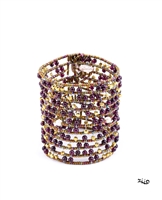 perfect for any occasion. This Bracelet by Ziio features White Seed Pearls, Ruby Red Garnet Gemstones & Gold Beads in a random mixed pattern. Cuff has two Sterling Silver Buttons for closure that make it easy to adjust the length. Hand crafted in Italy