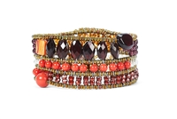 Ziio's Tabiz Collection, this linear beaded Bracelet has the warmth of the tuscan sunset. Red Garnets & Orange Carnelian Gemstones are accented with Red Zircon & Coral Glass Beads. Hand crafted in Italy using Murano Glass seed beads on stainless steel