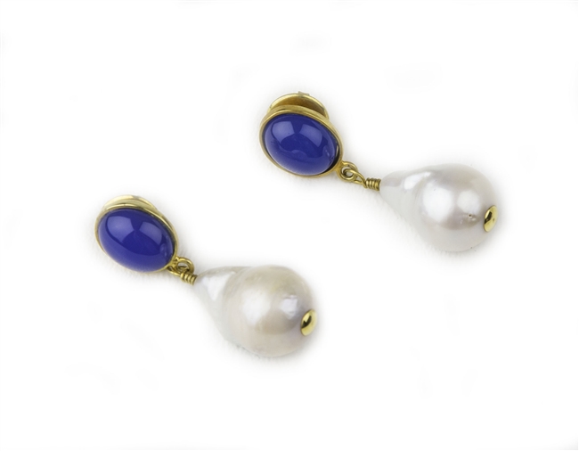 Brighten up your wardrobe with these Pearl Drop Earrings. A brilliant Blue Chalcedony Cabochon holds a large White Baroque Pearl Drop. Gold plated 925 Sterling Silver. Posts. L 1 3/4" X W 5/8"