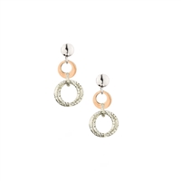 A petite two-tone, White & Rose Gold plated, Sterling Silver Drop Earring by Frederic Duclos. A White Silver Post holds a Rose Gold plated ring with a drop of two White Silver laser cut rings. Rhodium Plated Sterling to prevent tarnishing. L 1" X W 3/8"