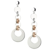 Four Ring Circle Drop Earrings in Polished Sterling Silver with laser cut jump rings in White Silver & Rose Gold plated. Frederic Duclos is known for his use of adding a touch of sparkle to his pieces through laser cutting. Rhodium plated. Posts.