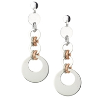 A Frederic Duclos update on your classic Sterling Silver Drop Earring. His "Freida" Earrings features three polished White 925 Sterling rings that graduate in size. They are connected with White & Rose Gold plated laser cut rings. Rhodium plated. Posts.