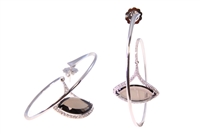 These one-of-a-kind Designer Earrings will take your breath away. Crafted in 18k White Gold descending from the center of the Hoop is a marquise cut Smokey Quartz Gemstone surrounded by pave set White Diamonds (1.35ctw). The Drop is hinged for movement.