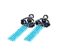 From Ziio's Twilight Collection - Beautiful long Tassel Earrings in Black & Blue. The posts feature Black Onyx & Tourmaline Gemstones with Lapis Gemstone Beads holding four Tassel drops of brilliant Blue Zircon. Sterling Silver Posts. Hand crafted