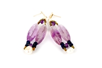Unique Artisan, designer drop Earrings by Ziio. These Limited-Edition Earrings feature two cylindrical, faceted Purple Amethyst Gemstones, hi-lighted by Blue Lapis beads and joined at the bottom by a single White Pearl. Gold plated Sterling Silver Posts.
