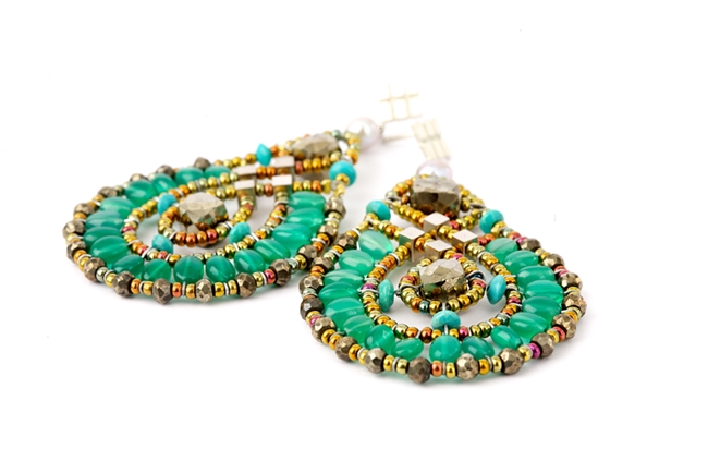 There is a reason this Earring is in Ziio's Permanent Collection. The oval tear-drop shape is perfect for every facial structure.These are in Green Onyx Gemstones accented with Pyrite and Blue Turquoise Beads. A single silver Pearl holds the drop.