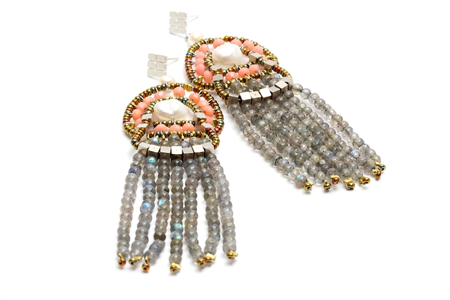 These chandelier, Fresh Water, White Pearl Tassel Earrings are definitely Pearls with Pizazz. Made in Italy by Ziio, the top drop holds a single Baroque Pearl surrounded by a ring of faceted Pyrite. Five long strands of White Pearls create the Tassel.