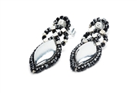 From Ziio's Shine Collection. A large Sterling Silver Bead is surrounded by the contrast of Black Zirconia Beads. Two White Seed Pearls are added for accent. 925 Sterling Silver, rhodium plated. Posts.