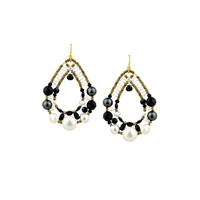 chandelier Oval Earrings have a light open look, but make a bold statement. They feature a medley of Black Gemstones in various shapes and sizes, Onyx, Spinel & Tourmaline, accented with White & Grey Pearls. On a framework of Murano Glass Beads. by Ziio