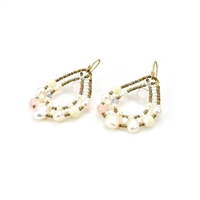these large, oval Hoop Pearl Earrings have a light  open look, but make a bold statement. They feature a medley of White Pearls in various shapes and sizes & Pink Morganite gemstones that blend harmoniously. On a framework of Murano Glass Beads
