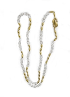 This is a Necklace you will reach for again and again - clear Crystal Beads are alternating with smaller brushed Yellow Gold plated Beads. Wear it long or doubled. Easy to layer with other Gold Necklaces. Made in Italy by Anticoa. Length 42", hook latch