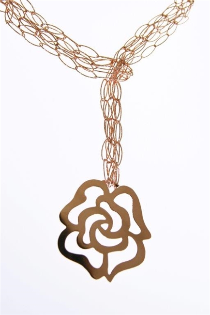 Three strand, laser cut, chain link Necklace in Rose Gold plated 925 Sterling Silver with a Flower as a Pendant drop. The open links have a beautiful reflective quality adding a hint of sparkle. Wear the Necklace long, layered or as a lariat.. 42" Long.