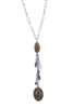 A beautiful, dark Rhodium plated Sterling Silver Y-Necklace is complimented by four Pink Quartz Gemstone faceted beads on the neck Chain and Animal printed Enameled Beads with charms of various shapes on the tassel drop. Made in Italy by Claudio Faccin.