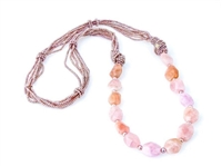 Rajola's long Forever Necklace done in multi-strands of Pink Pearls & Morganite Gemstones. The soft hues of this Designer piece make it the perfect Neutral to wear with most any color.
36" in length.