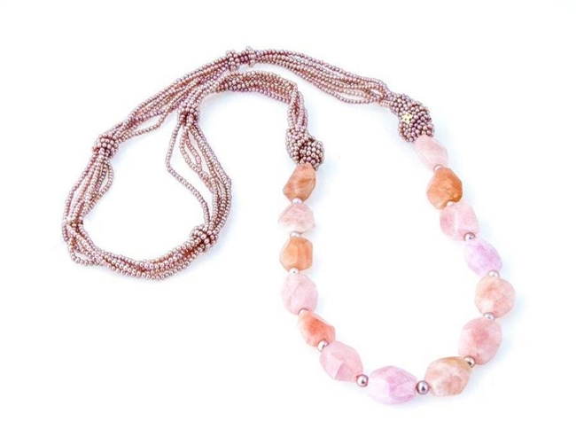 Rajola's long Forever Necklace done in multi-strands of Pink Pearls & Morganite Gemstones. The soft hues of this Designer piece make it the perfect Neutral to wear with most any color.
36" in length.