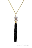 Beautiful Tassel Necklace will never go out of style. From a single White Mabe Pearl descends a Tassel of Black Spinel Gemstones. Wear with a "T" or little Black Dress. Made in the U.S. by Silver Pansy. 24" Gold Filled Sterling chain,Tassel length 2 1/2"